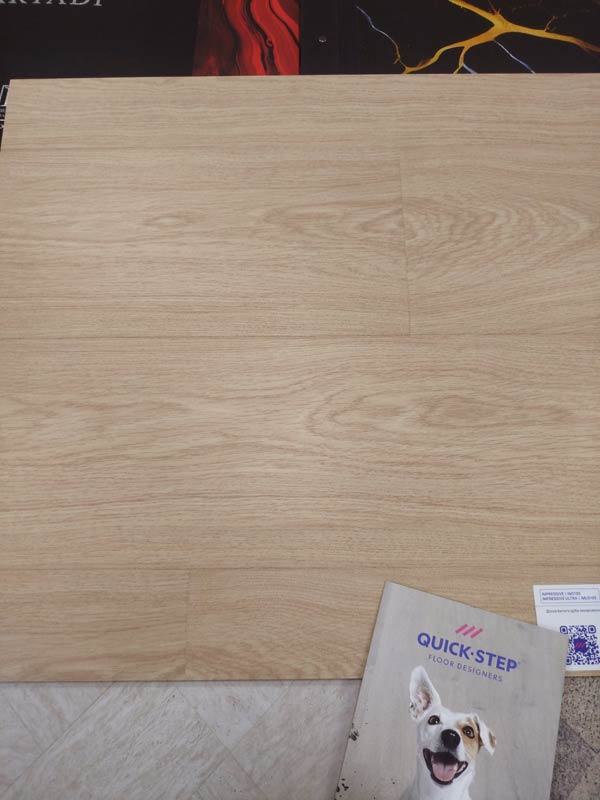 Ламинат Quick-Step Impressive Доска Белого Дуба Лакированная IM 3105 крупным планом
