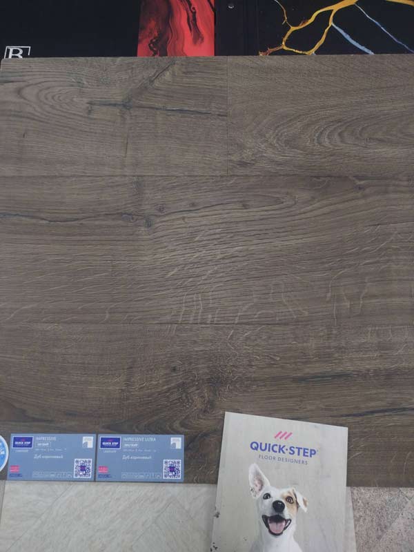Ламинат Quick-Step Impressive Дуб Коричневый IM 1849 крупным планом